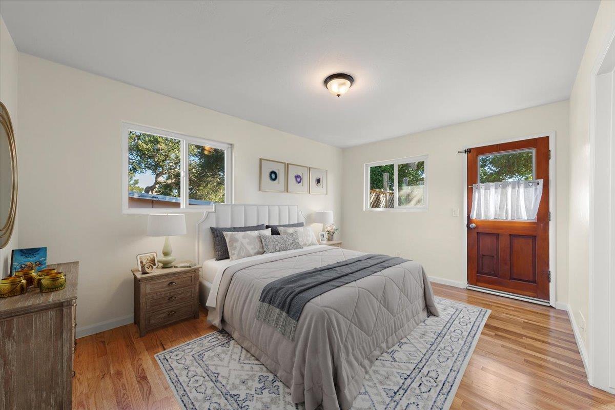 41 Ralston Drive Monterey, CA 93940 - Photo 16 of 31 a bedroom with a bed and a couch