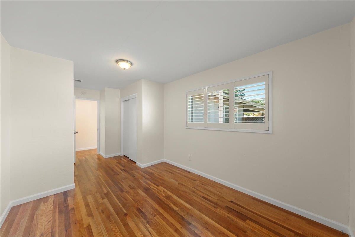 41 Ralston Drive Monterey, CA 93940 - Photo 18 of 31 a view of a room with wooden floor and windows