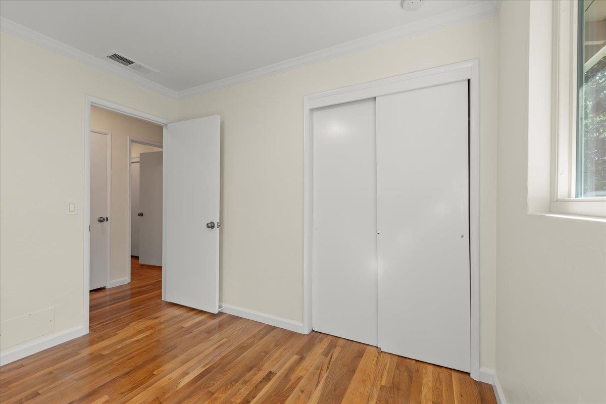 41 Ralston Drive Monterey, CA 93940 - Photo 22 of 31 a view of an empty room with wooden floor and a window