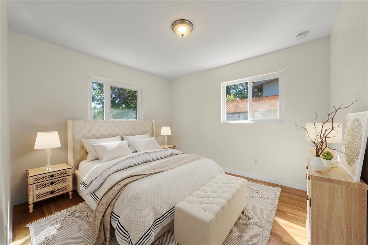 41 Ralston Drive Monterey, CA 93940 - Photo 26 of 31 a bedroom with a bed and a lamp