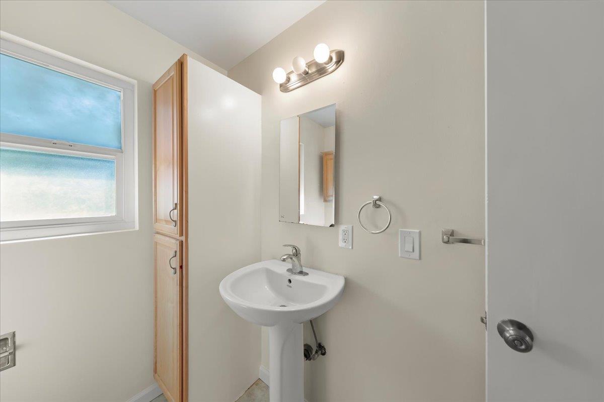 41 Ralston Drive Monterey, CA 93940 - Photo 28 of 31 a bathroom with a sink and mirror