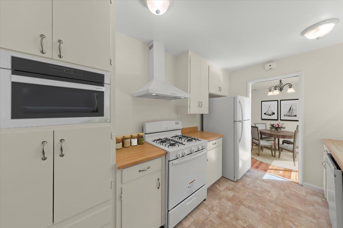 41 Ralston Drive Monterey, CA 93940 - Photo 10 of 31 a kitchen with stainless steel appliances a stove microwave and cabinets