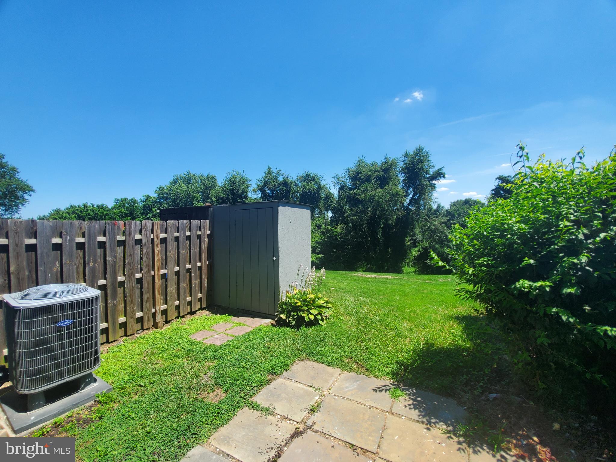 19349 Keymar Way Montgomery Village, MD 20886 - Photo 11 of 13 a view of a deck with a garden