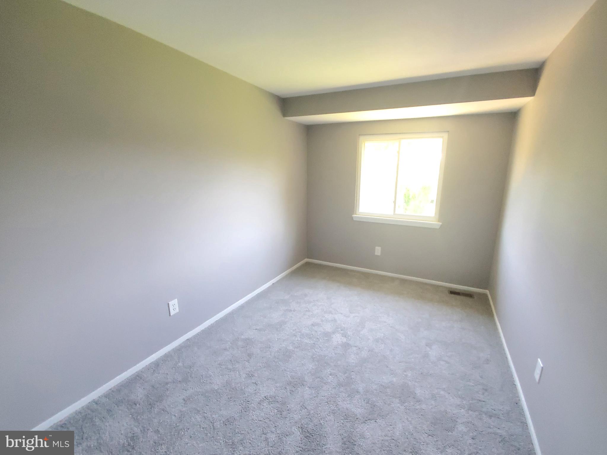 19349 Keymar Way Montgomery Village, MD 20886 - Photo 7 of 13 an empty room with a window