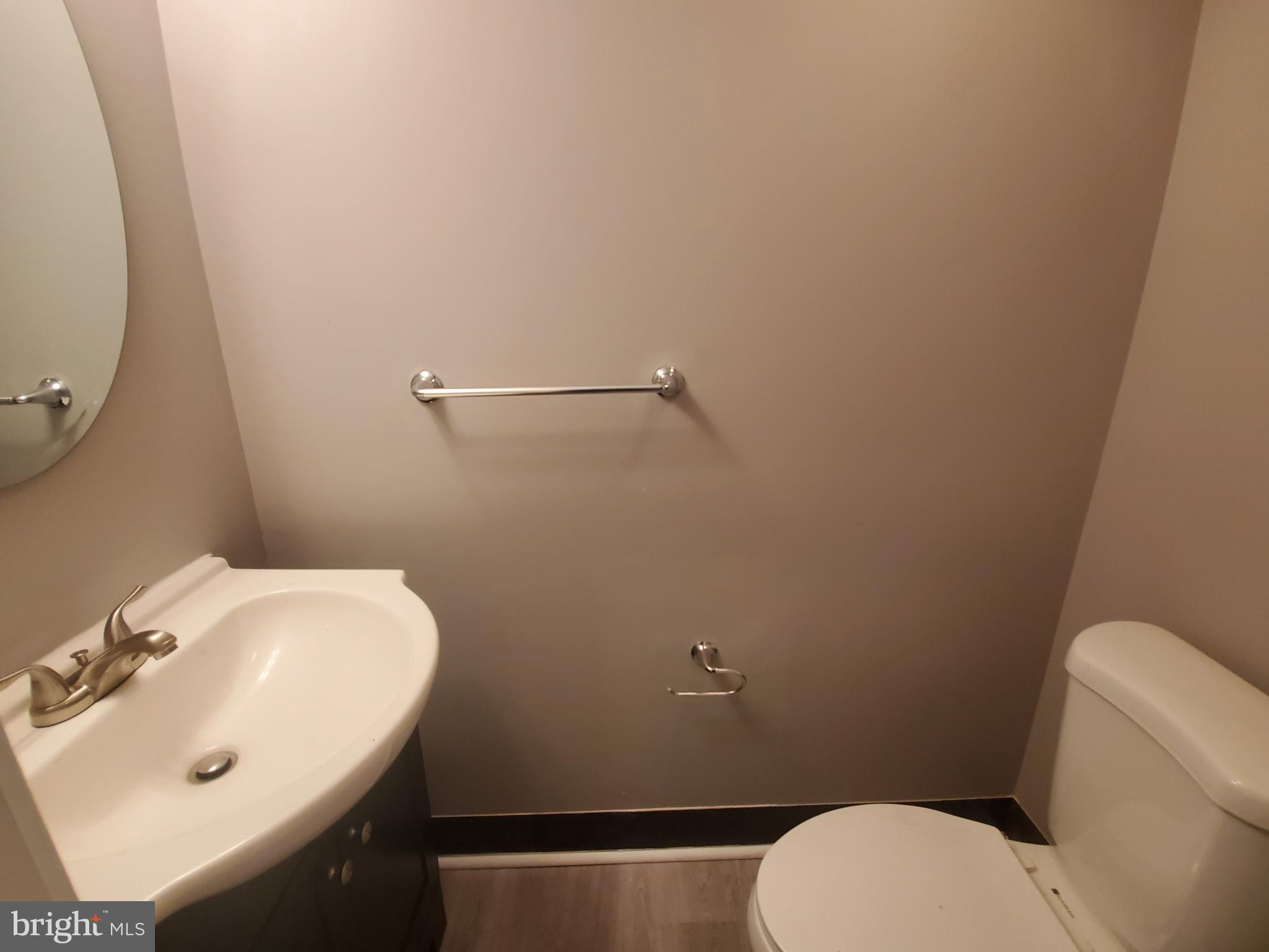 19349 Keymar Way Montgomery Village, MD 20886 - Photo 10 of 13 a bathroom with a sink and toilet