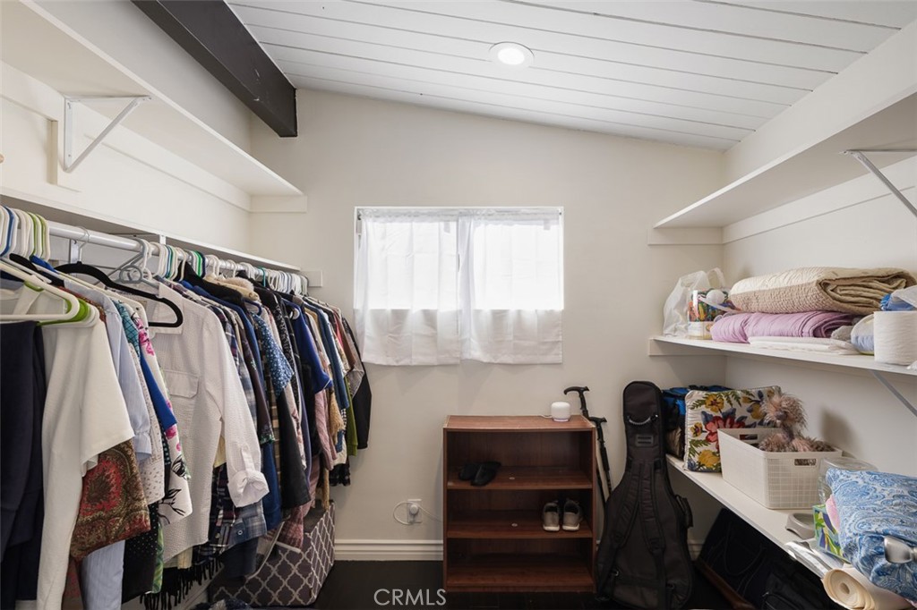 1391 North Fenimore Avenue Covina, CA 91722 - Photo 30 of 43 a view of walk in closet with clothes and shoes