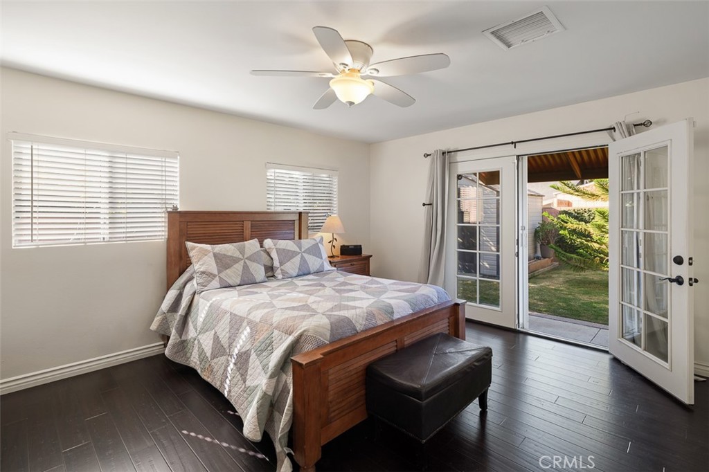 1391 North Fenimore Avenue Covina, CA 91722 - Photo 32 of 43 a bedroom with bed and wooden floor