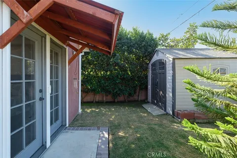 a view of a backyard with plants