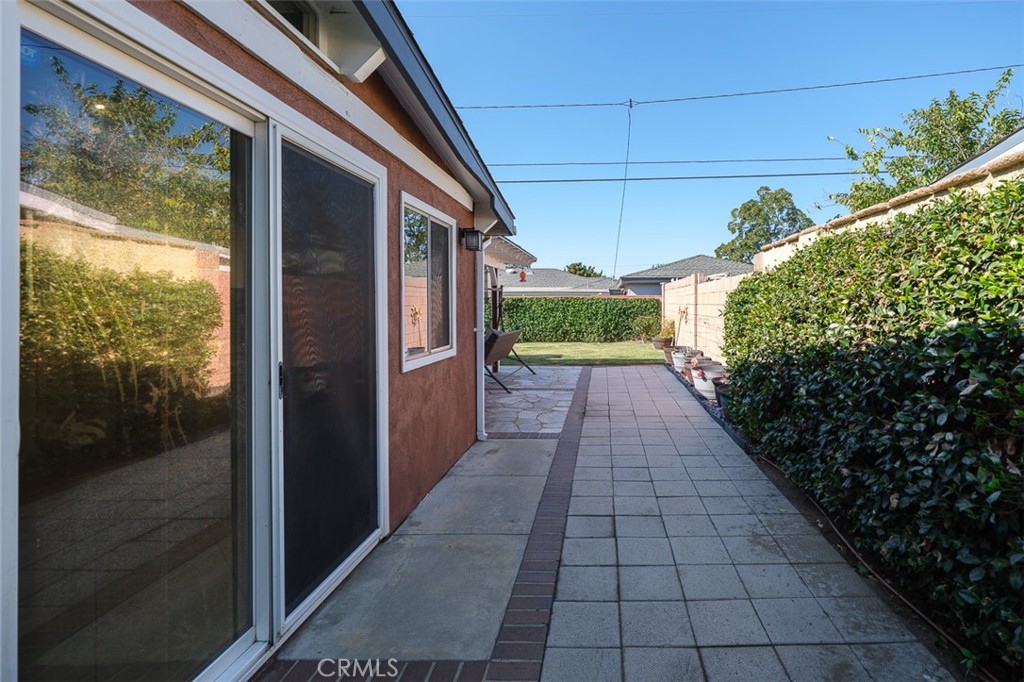 1391 North Fenimore Avenue Covina, CA 91722 - Photo 39 of 43 a view of a pathway both side of house