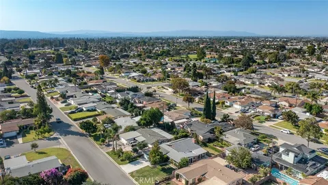 an aerial view of a city with lots of residential buildings