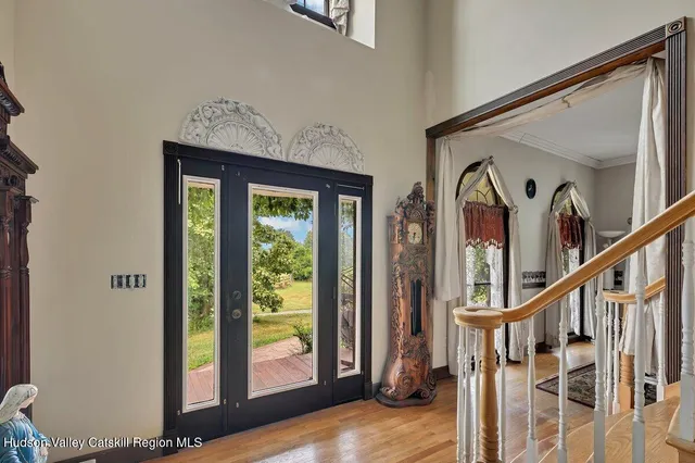 a bathroom with a toilet a sink and a window
