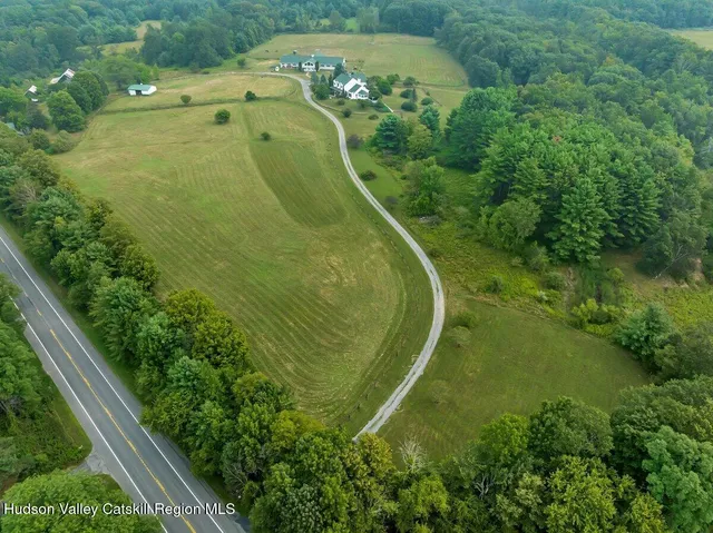 a view of a bedroom with a furniture and staircase