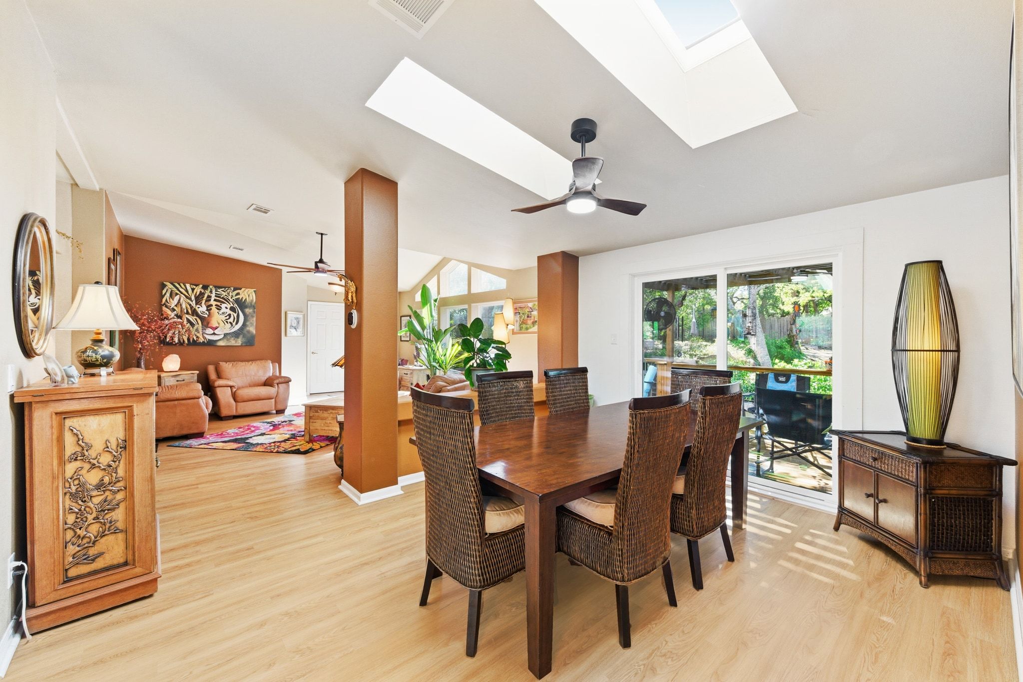 120 Cedar Bend Road Wimberley, TX 78676 - Photo 13 of 40 a view of a dining room with furniture window and wooden floor