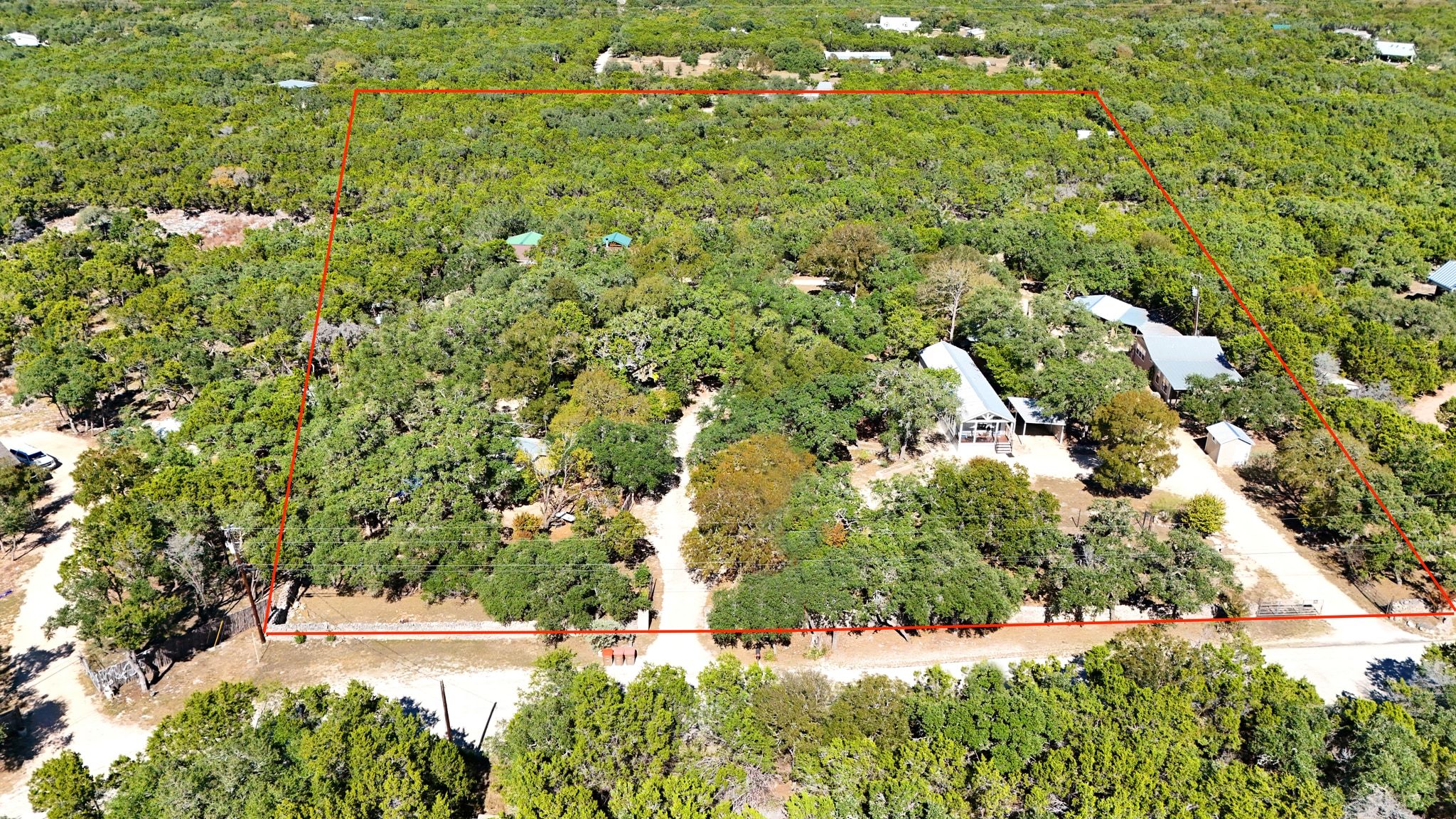 120 Cedar Bend Road Wimberley, TX 78676 - Photo 2 of 40 a view of a yard