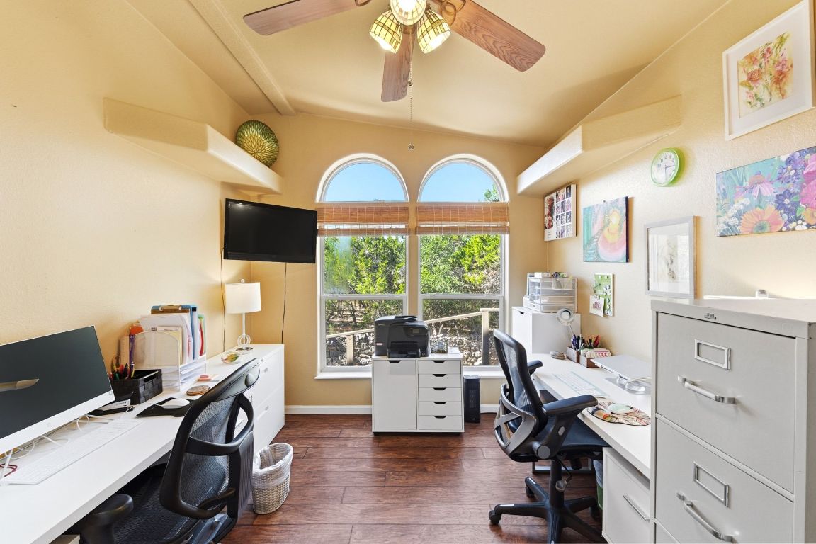 120 Cedar Bend Road Wimberley, TX 78676 - Photo 22 of 40 a view of a workspace with furniture and a window