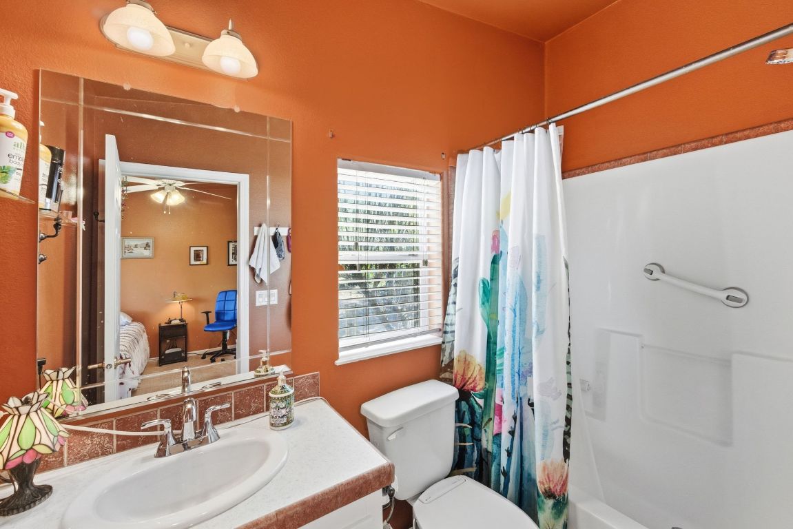 120 Cedar Bend Road Wimberley, TX 78676 - Photo 24 of 40 a bathroom with a sink and a mirror