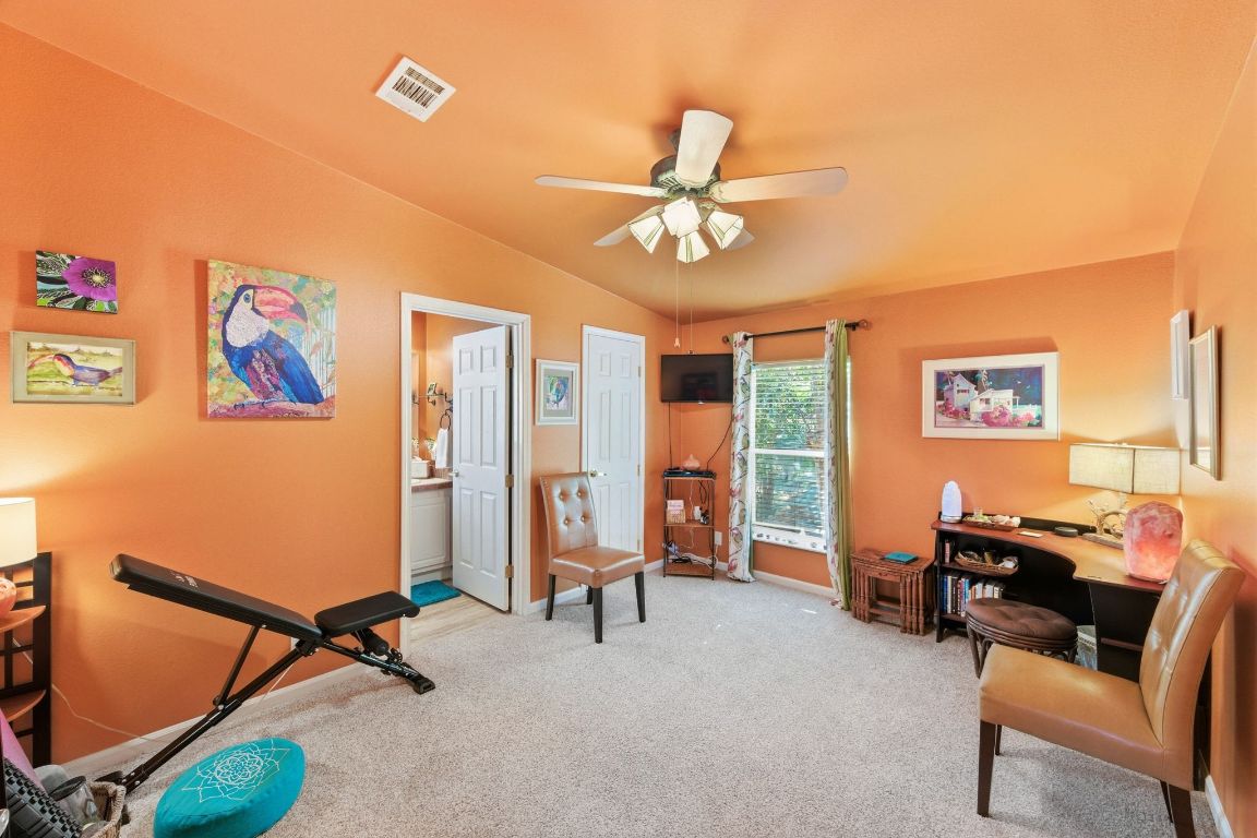 120 Cedar Bend Road Wimberley, TX 78676 - Photo 25 of 40 a view of a room with gym equipment