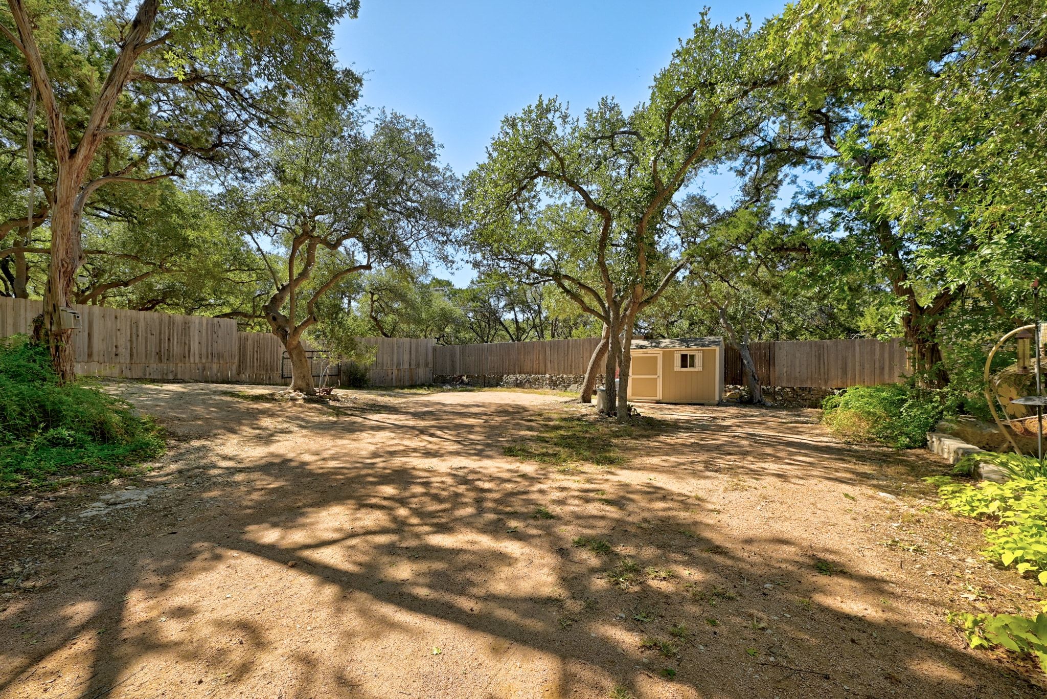 120 Cedar Bend Road Wimberley, TX 78676 - Photo 28 of 40 a view of a yard with a tree