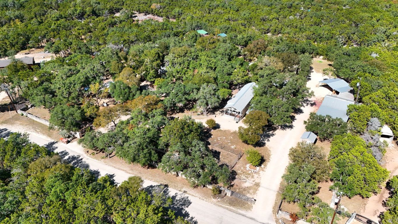 120 Cedar Bend Road Wimberley, TX 78676 - Photo 3 of 40 an aerial view of a house with a yard and large trees