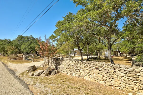 a view of a small yard in front of a house