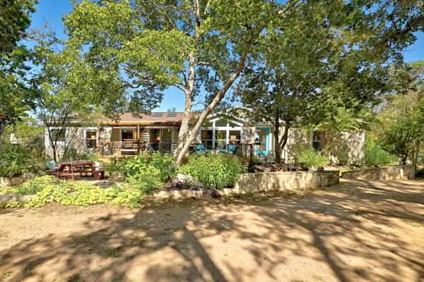 a view of a patio with wooden floor