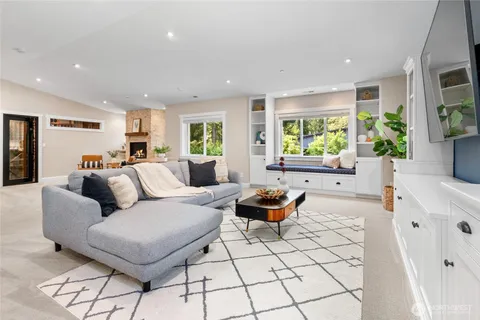 a living room with furniture and a gate