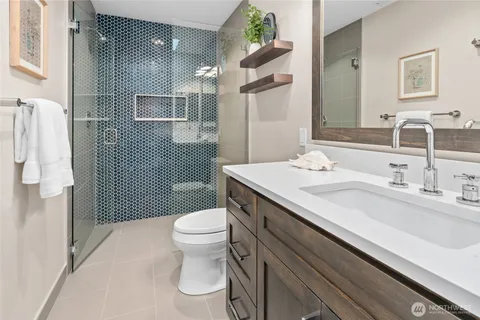 a kitchen with a sink appliances and a counter top space