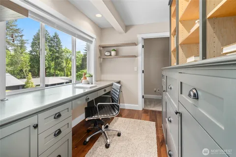 a kitchen with a stove and a sink