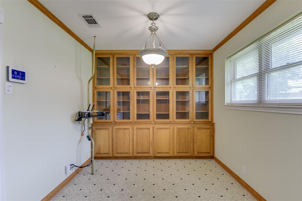 802 Cardinal Road Mansfield, TX 76063 - Photo 19 of 31 Unfurnished dining area featuring ornamental molding