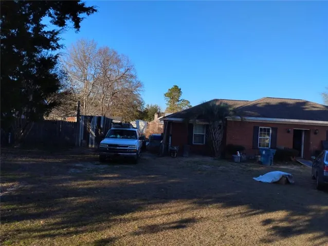 a house view with a garden space