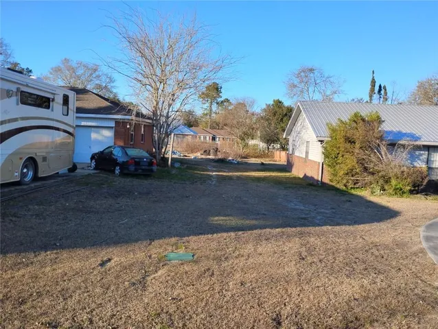 a view of a street with a house