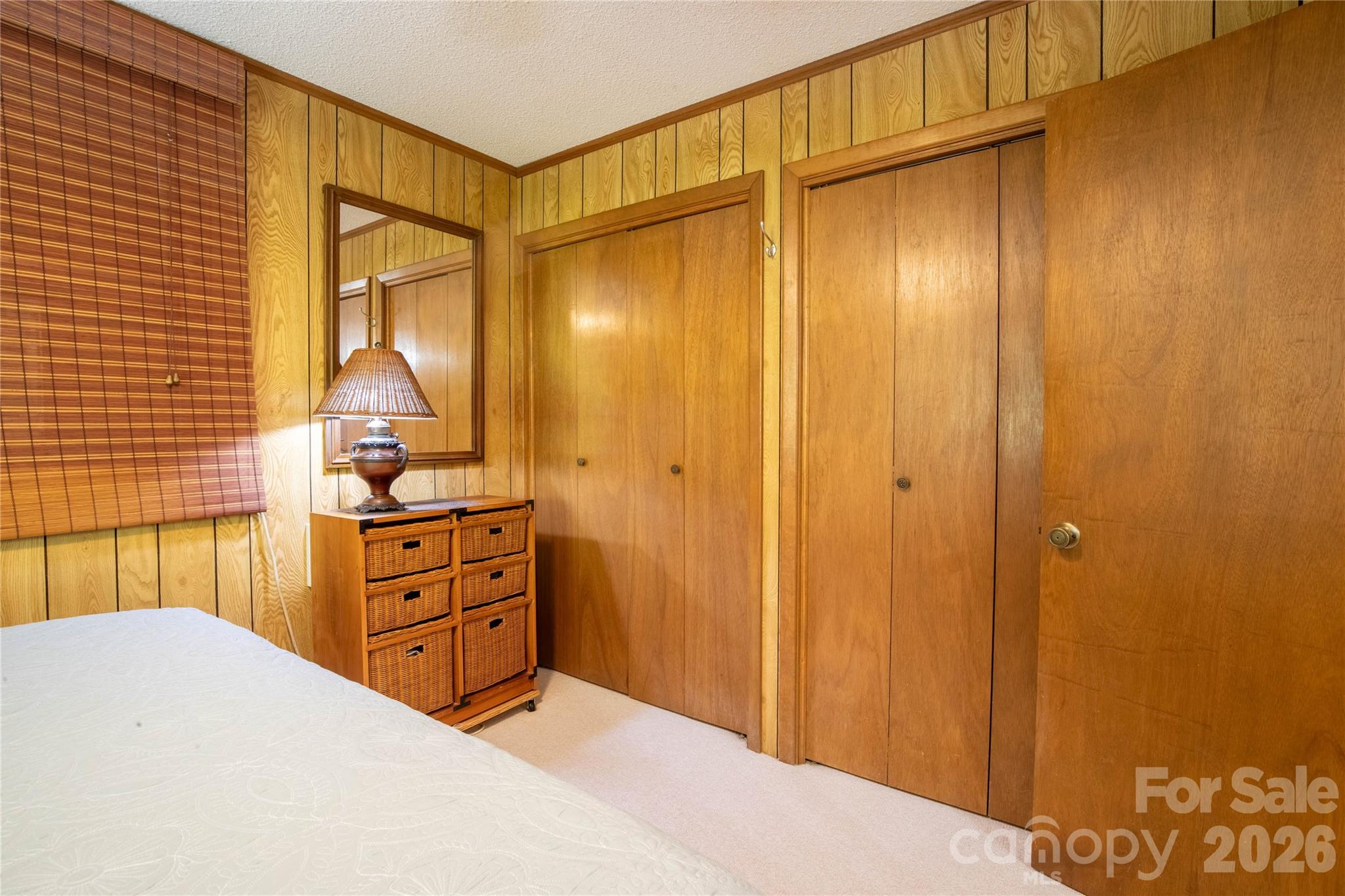 93 Franklin Crest Road Spruce Pine, NC 28777 - Photo 38 of 47 a bedroom with a bed and a dresser
