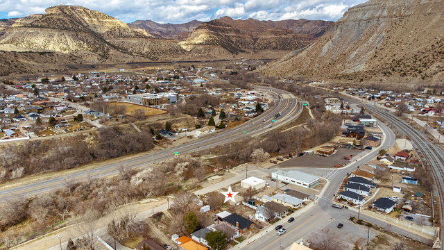 10 South 100 West Helper, UT 84526 - Photo 9 of 11 Mountain view with nearby suburban area
