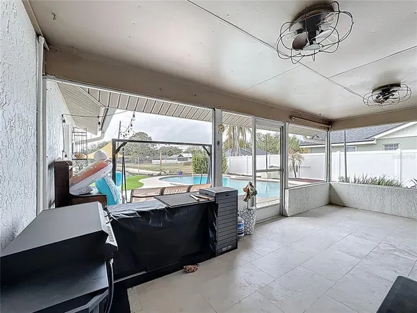 a bedroom with a bed and a chair