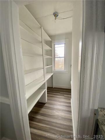 15-17 Ridgewood Street, Unit 2 Waterbury, CT 06710 - Photo 6 of 8 a view of an empty room and a window