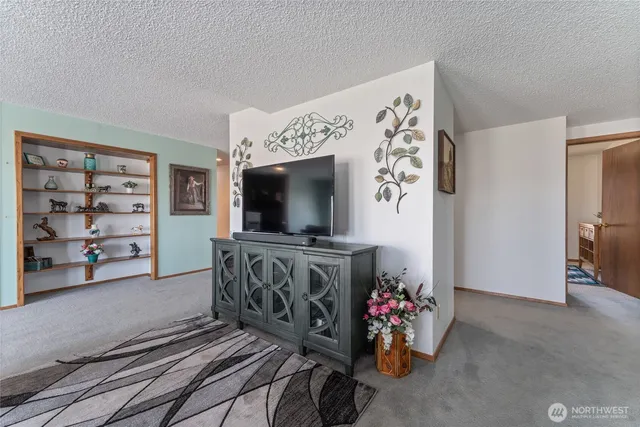 a workspace with furniture and wooden floor