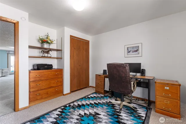 a workspace with furniture and lamp