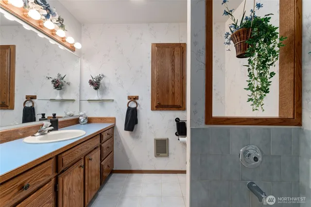 a bedroom with a bed and a cabinets