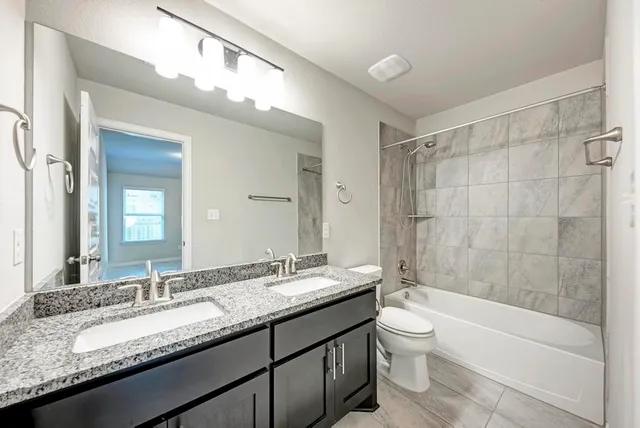 an aerial view of a house with outdoor space