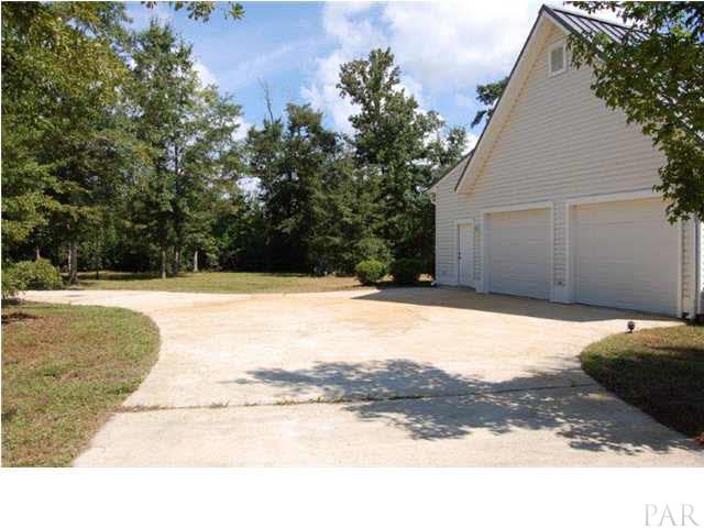 1847 Pearson Road Milton, FL 32583 - Photo 16 of 23 Side entry garage with workshop
