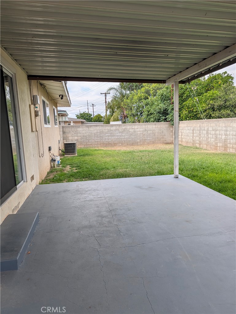 8641 Garfield Street Riverside, CA 92504 - Photo 18 of 19 a view of a room with porch and wooden fence