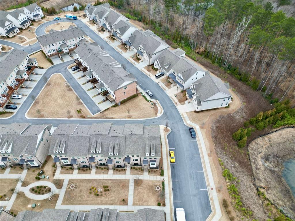 3217 Bartee Walk Suwanee, GA 30024 - Photo 6 of 36 an aerial view of a house