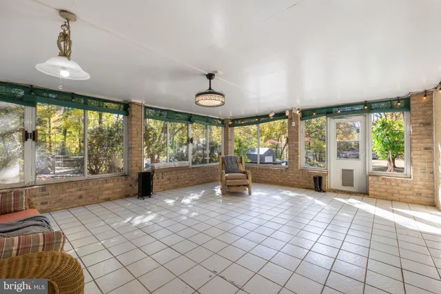 a kitchen with a refrigerator and a stove