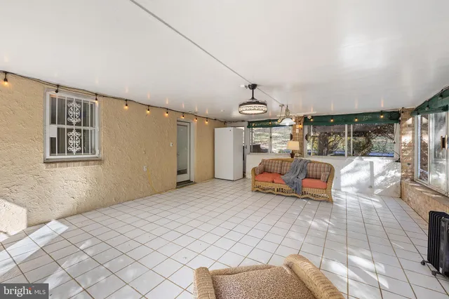 a view of a kitchen with a sink
