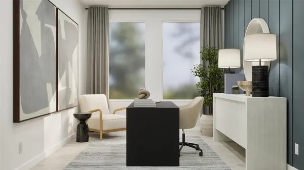 a dining room with a table and chairs