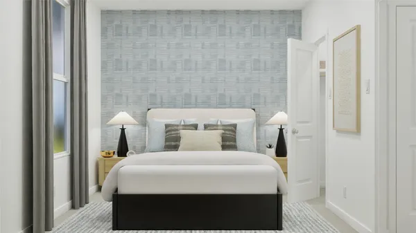 a bedroom with a bed and a mirror