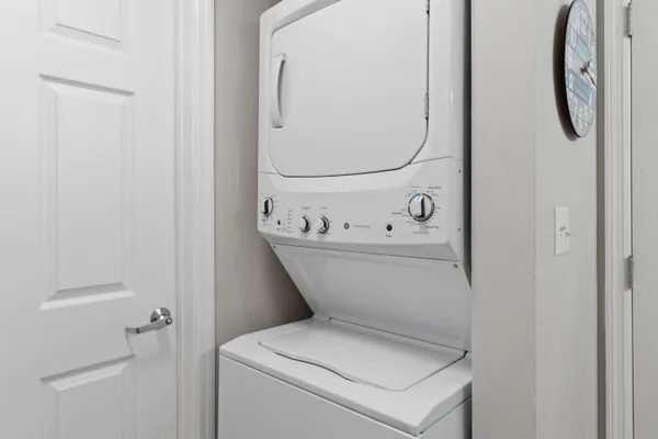 a bathroom with a toilet and a mirror