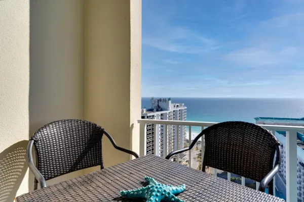 a view of balcony with furniture