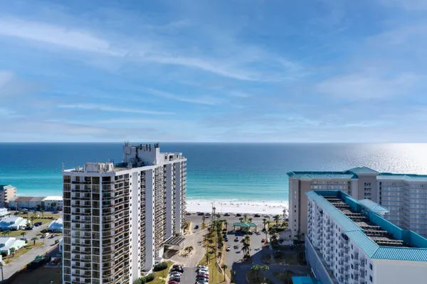 a view of city with ocean