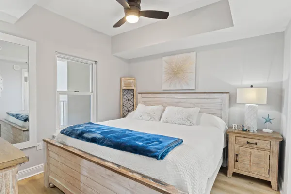 a bedroom with a bed and a dresser